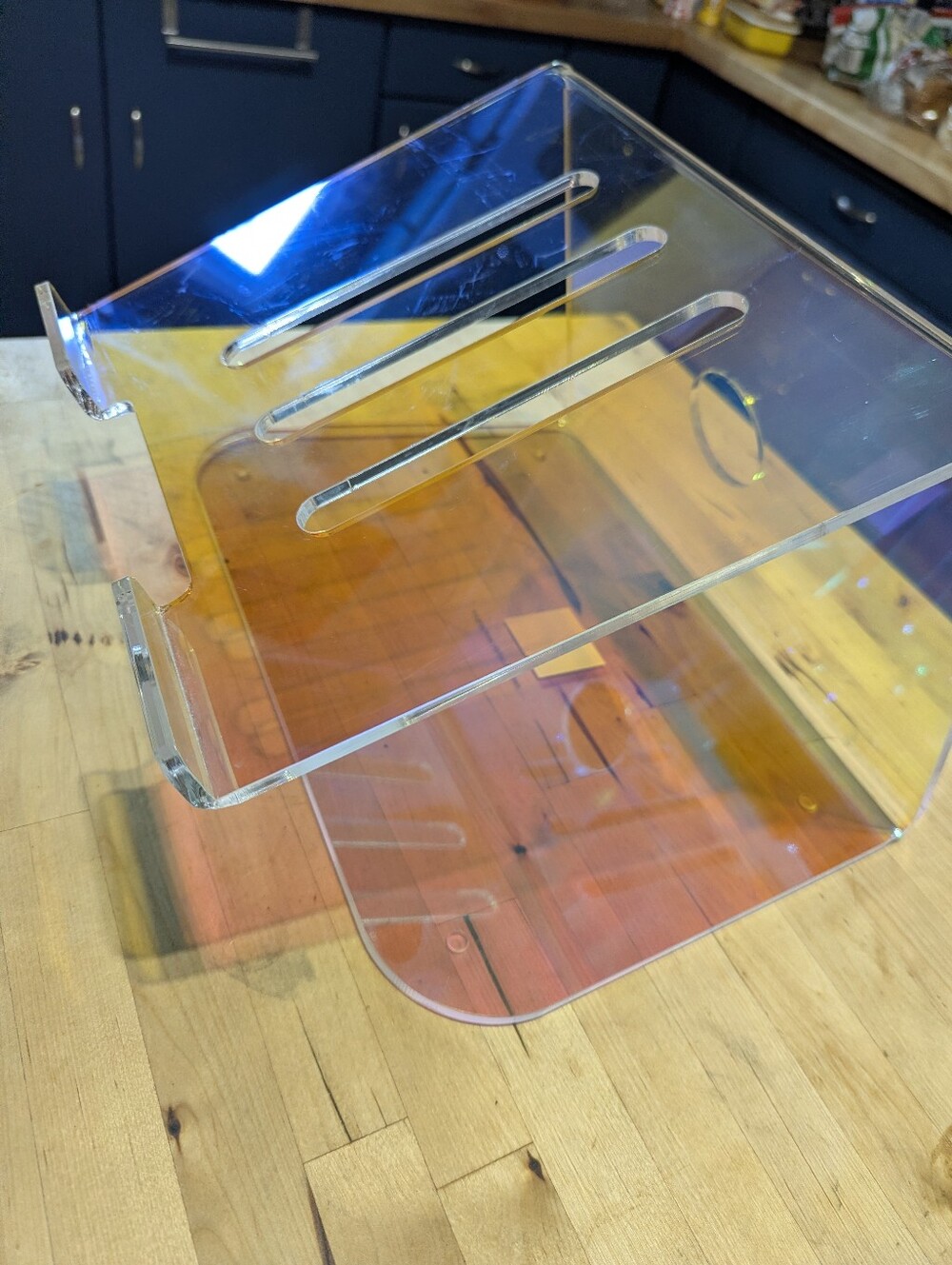 Ashland Iridescent Display Stand with Orange and Blue Sheen